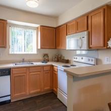 open kitchen with oak cabinets